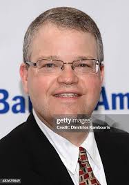 Mario Batali and wife Susan Cahn attend the Food Bank for New York... News  Photo