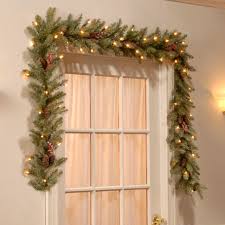 The wintry pine garland features mixed branch tips trimmed with red berries, pine cones and snowflakes. 9 Dunhill Fir Pre Lit Garland With 50 Warm Clear White Lights Reviews Birch Lane