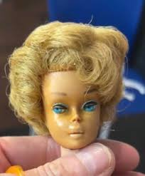 What type of Barbie doll is this with a midge body and side part hair?