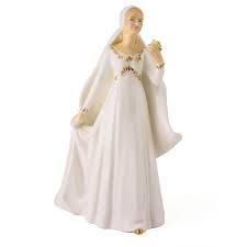 Designed with the finest of detailing, discover intricate accents including floral bustiers and rose bouquets to opulent swarovski® crystal placement. Royal Doulton Bride Figure Hn2873
