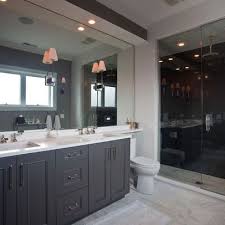 A bathroom vanity is a piece of furniture that holds your bathroom sink and has cabinets with doors or drawers that you can use to store toiletries and other supplies. Bm Kendall Charcoal On The Vanity Grey Bathroom Cabinets Grey Bathrooms Grey Cabinets