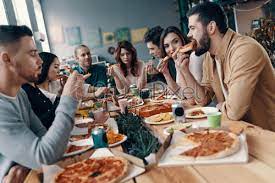 Soon the discussion gets around to their favorite sexual fantasies Great Food And Company Group Of Young People In Casual Stock Photo Crushpixel