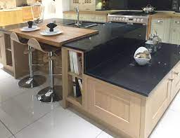 Contemporary Kitchen Island Design In Lissa Oak With Split Level Granite Worktops And Brea Diy Kitchen Remodel Kitchen Cabinet Design Kitchen Island With Sink