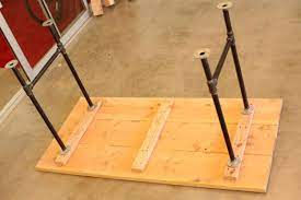 The plastic leveler allows you to level out unevenness of the ground. Diy Pipe Leg Table Workbench Plans And Rustic Furniture Tutorial