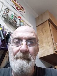 What is the purpose of the two Baxter county deputies escorting a large  white bus