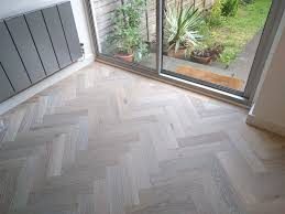 We Laid This Parquet Floor In A Classic Herringbone Design It Helps To Lead The Eye Out To The Lovely Garden Herringbone Wood Flooring Stairs Cladding
