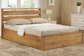 Modena Solid Oak Ottoman Storage Bed Frame This king sized ottoman bed is also perfect for large, grand bedroom spaces, as its modern upholstery imparts an almost regal quality to your rooms aesthetic. modena solid oak ottoman