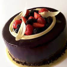 Chocolate Sponge Cake Layered With Chocolate Mousse And Blackcurrant Jelly Decorated With Chocolate Mirror Glaze Berri Cake Fruit Jelly Chocolate Sponge Cake
