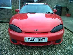 Image result for Bright Silver 1999 Tiburon