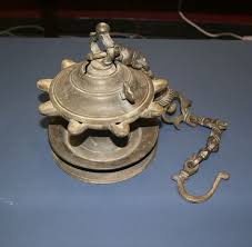 It includes some metal decorations, crystals and a nice floral pattern in its white top. Indian Bronze Hanging Oil Lamp Oil Lamps Brass Decor Lamp