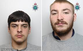 Moment masked carjackers leap from moped and hold driver at knifepoint