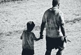 He finds himself confronted with zombies. Father And Son Holding Hands Picography Free Photo