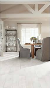Nothing Says Coastal Beach House Better Than Layered Whites And Light Washed Floors Inspired By Seashells And Sea G Room Design Slipcovers For Chairs Flooring