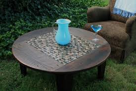 This square outdoor coffee table features four hidden side tables. Outdoor Wooden And Tiled Coffee Table