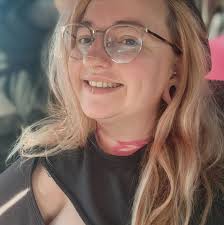 Who is a local tattoo artist that specializes in fine line script?