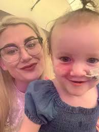 Furious mum claims Legoland staff told her she 'wasn't allowed' to feed  brain-damaged daughter in cafe