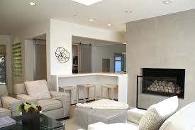 On the other side of the room, a sofa and chairs form a conversational cluster around the fireplace. My Houzz Grand Openings For A Dallas Ranch
