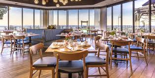 As you're being guided to your seat, you may notice how long the main dining room is. Hotel Bars Restaurants In Point Clear Alabama Grand Hotel Golf Resort Spa