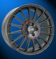 Popular across the range of modified cars, this stunning white wheel adds a sporty look to your mini, no matter where you power range ends. Oz Superturismo Gt 8 X 18 5 X 112 35 Matt Schwarz Mit Roter Schrift Gunstig Kaufen Ebay