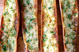 Melted garlic butter coats the salmon and vegetables, adding depth of flavor and richness to the dish. Perfect Garlic Bread Smitten Kitchen