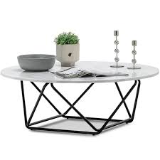 Terrazzo flooring is a design element found in the most iconic midcentury homes, but it's a very expensive design element. Continental Designs Black White Aria Marble Coffee Table Temple Webster