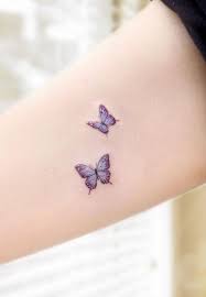Pin By Crissy Meyer On I Really Want In 2020 Tiny Butterfly Tattoo Unique Butterfly Tattoos Purple Tattoos