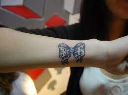 Take a look at the following pictures to get some ideas as how they must be portrayed. 50 Eye Catching Wrist Tattoo Ideas Art And Design Neck Tattoo Bow Tattoo Small Wrist Tattoos