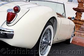 Image result for Old English White 1961 MG