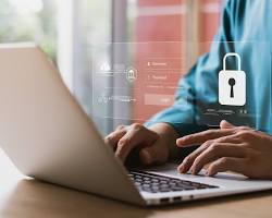 Image of person shopping online on a laptop with a secure padlock symbol