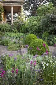 Required Reading Three Generations Of Women Gardeners In The Cotswolds Gardenista Succulents Garden Garden Signs Garden Design