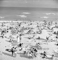 For miami beach coast guard station, florida. Beachgoers Enjoying The Warm Weather On New Year S Day 1948 In Miami Beach Florida Memory Florida Art Deco Beach Miami Beach