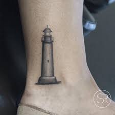 A lighthouse is a unique sea tattoo and may be used as a way to symbolize coming home. 40 Incredible Lighthouse Tattoo Designs Tattooblend