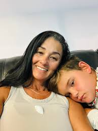 Brody made me a shell necklace out of fishing line with Kristen Gilliam  Rimes