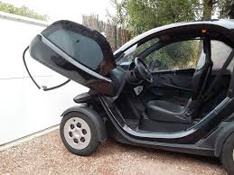 The top speed is just 50 mph. English Twizy X Files Renault Twizy Replace A Door Stop