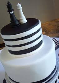 A Classic Black And White Wedding Cake With Custom Chess Piece Bride And Groom Topper Cake Designs Birthday Black And White Wedding Cake Themed Wedding Cakes