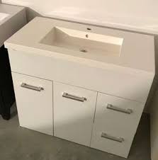 The monoblock pillar tap is mounted on the right hand side of the sink as standard but can be mounted on the left hand side on request. Modern Fancy Resin Stone Bathroom Cabinet Wash Basin