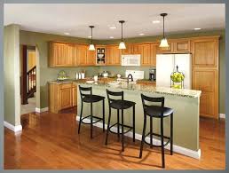 Steamed milk, and other light creamy colors, are great choices to pair with honey oak cabinets if you want to moderate the tones in the wood. Kitchen Wall Colors With Light Wood Cabinets And Slim Table Bedroom Colour Schemes