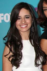 Camila Cabello Wavy Dark Brown Side Part Hairstyle