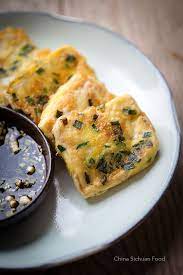 Pan Fried Tofu With Egg And Chive China Sichuan Food Pan Fried Tofu Tofu Recipes Fried Tofu