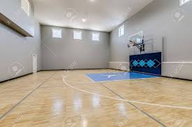 With this amazing indoor basketball court, you can invite your friends over for some friendly competition, no matter what time of year it is! Indoor Home Basketball Court With High Windows Stock Photo Picture And Royalty Free Image Image 148433399