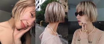 撞色短发” 这款发色的设计非常时尚且具有个性化，属于一种#冷调浅金与深棕色的对比色设计1. 发色分析• **顶部：**