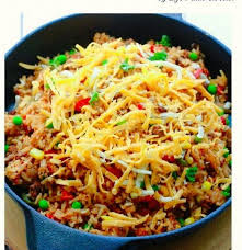 One Pan Mexican Rice Skillet Makes The Perfect Easy 30 Minute Weeknight Meal Best Of All So Simple To Cu Mexican Food Recipes One Pot Rice Meals Mexican Rice