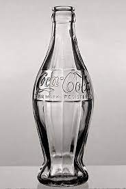 Drop two mentos candies into the second bottle — and so on — until you've completed the experiment with all ten bottles. The Story Behind Coca Cola S Iconic Coke Bottle