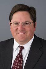 Charles E. Simpson, Jr.