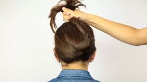 A twisted half down and a simple claw clip. 4 Ways To Put Your Hair Up With A Jaw Clip Wikihow