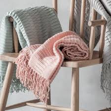 Linear Pleat Throw Home Accessories Cushions Throws We sell current, unusual pieces which are carefully selcted to make sure we cater for all shapes, sizes and ages.