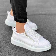 Il pellame, il cuoio e ogni altro materiale utilizzato per produrre le nostre scarpe da donna attraversa un'attenta selezione per essere poi lavorato dai nostri artigiani. Casual Sneakers With Stitch And Side Zip Design In White