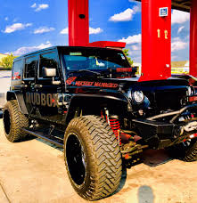Black And Blue Tis Wheels Jeep With 22 Inch Tis Wheels And 37 Atturo Tires Atturotires Tiswheels Sheetz Jeep Jeep Truck Jeep Life