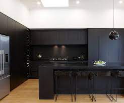 Contemporary kitchen designs in white men's hair. A Matte Black Kitchen Makes A Bold Statement In This Auckland Villa Matte Black Kitchen Modern Black Kitchen Black Kitchens