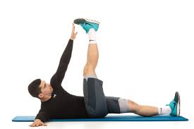 How do you do toe touches? Crossover Toe Touch Crunch Total Workout Fitness